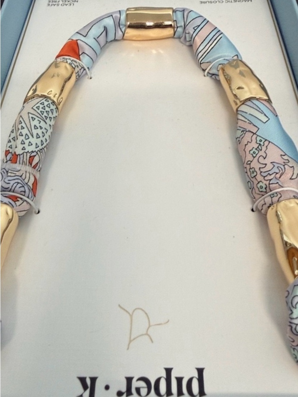 Piper K Pastel Blue and Gold Printed Silk Tube Necklace - Picture 4 of 5